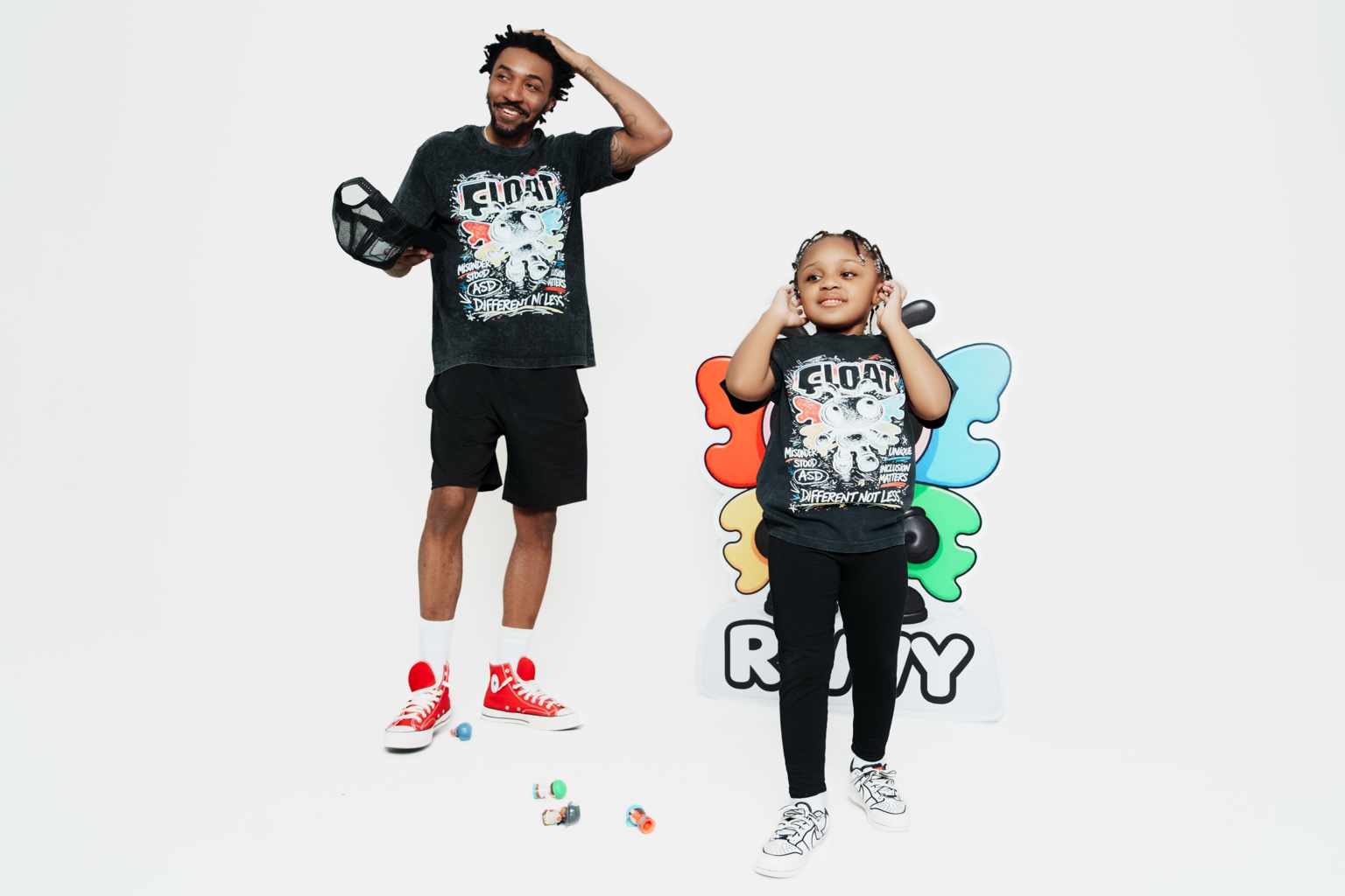 River and her dad wearing Float Forward shirts during a photo shoot